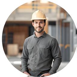 Retrato circular de Tam Sitjar en un entorno de obra con casco y mirada confiada